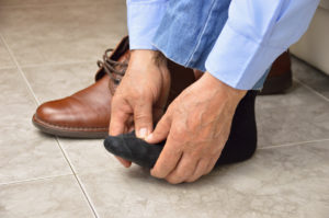 The most Reputable Middletown foot doctor consulting a patient about a wide range of foot conditions while conducting assessments to ensure the clients' feet are in their best state